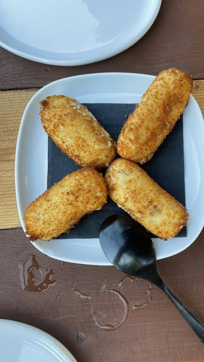 Sfeerbeeld: gefrituurde snacks (Unsplash)